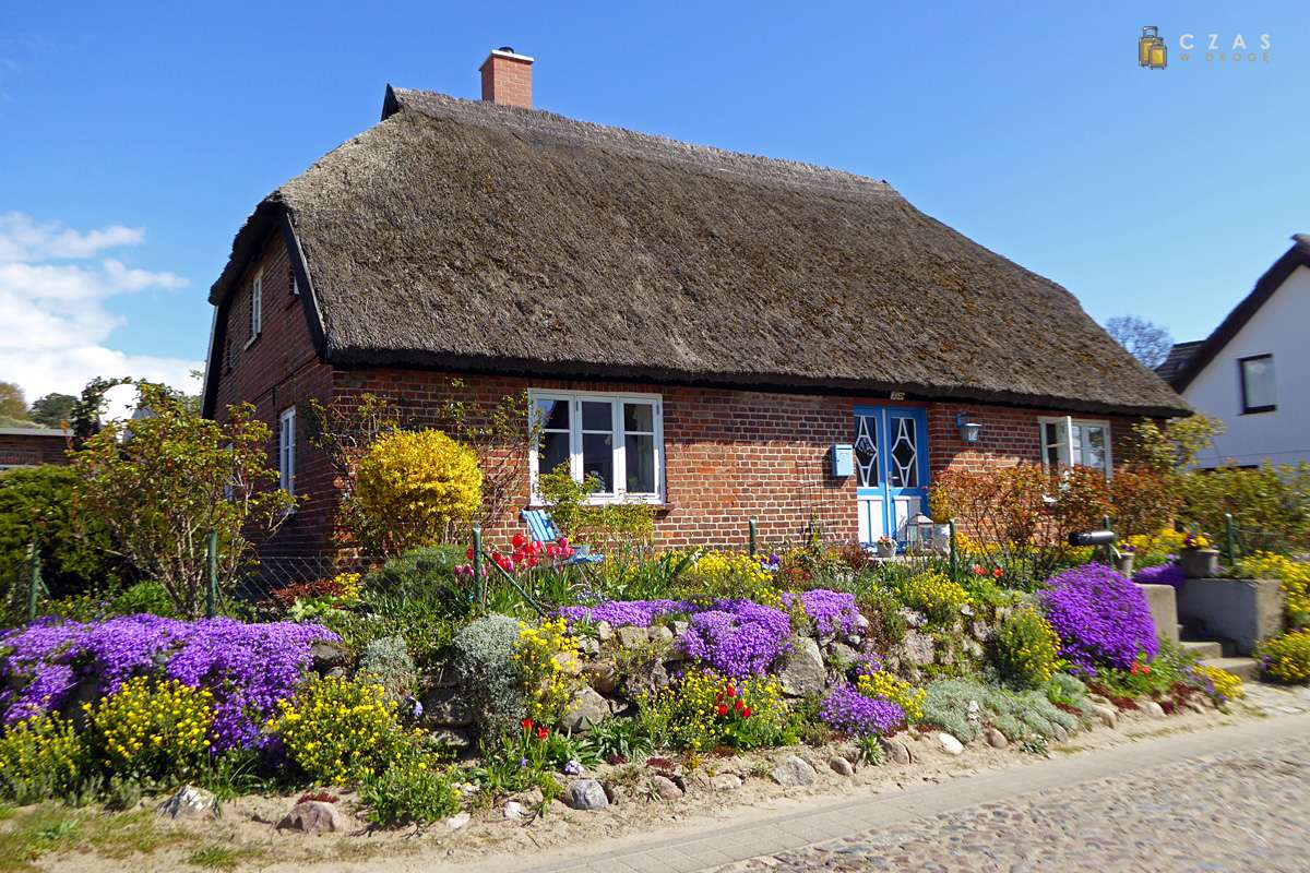 Cottage mit Strohdächern Puzzlespiel online