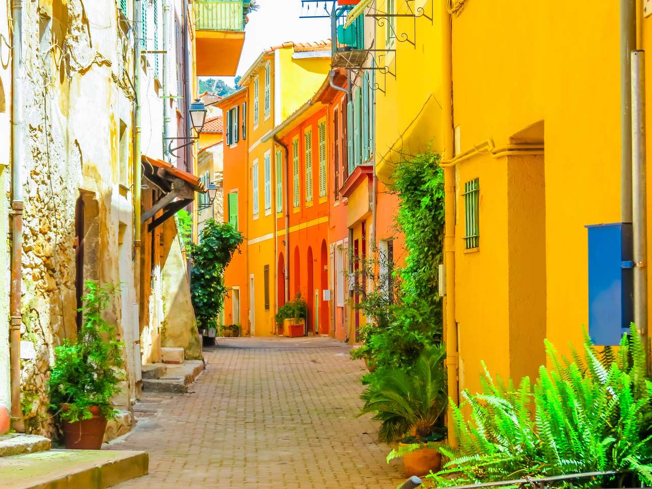 Casas amarelas brilhantes no Mediterrâneo quebra-cabeças online