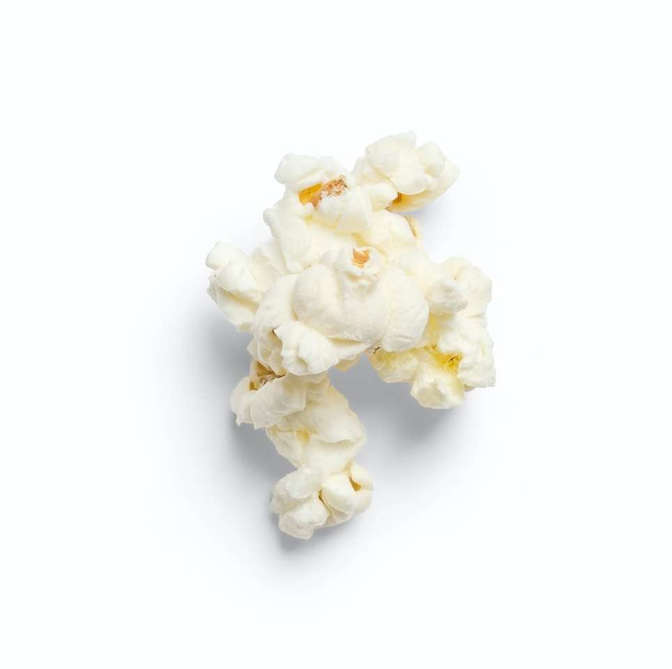 біла квітка на білому тлі пазл онлайн