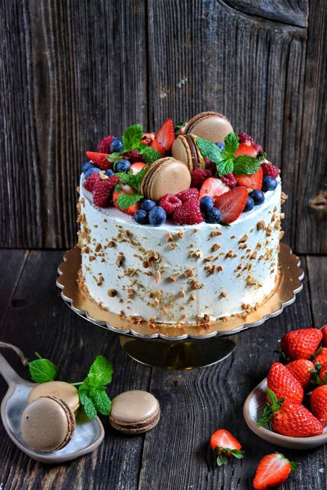 Um bolo em miniatura com cereja frużelina quebra-cabeças online