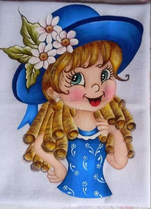 Cappello bambola e camicetta blu puzzle online