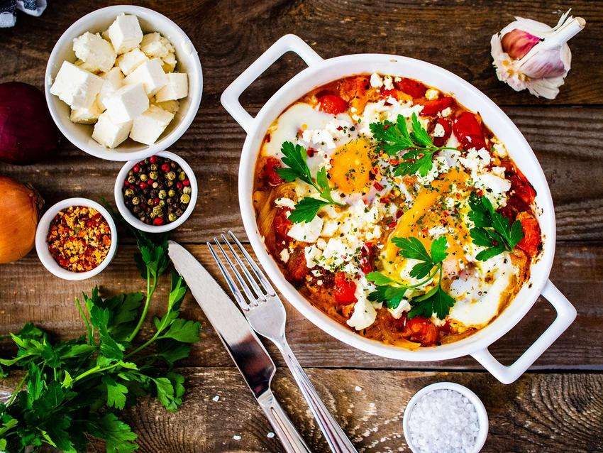 Shakshouka with tomatoes and cheese jigsaw puzzle online