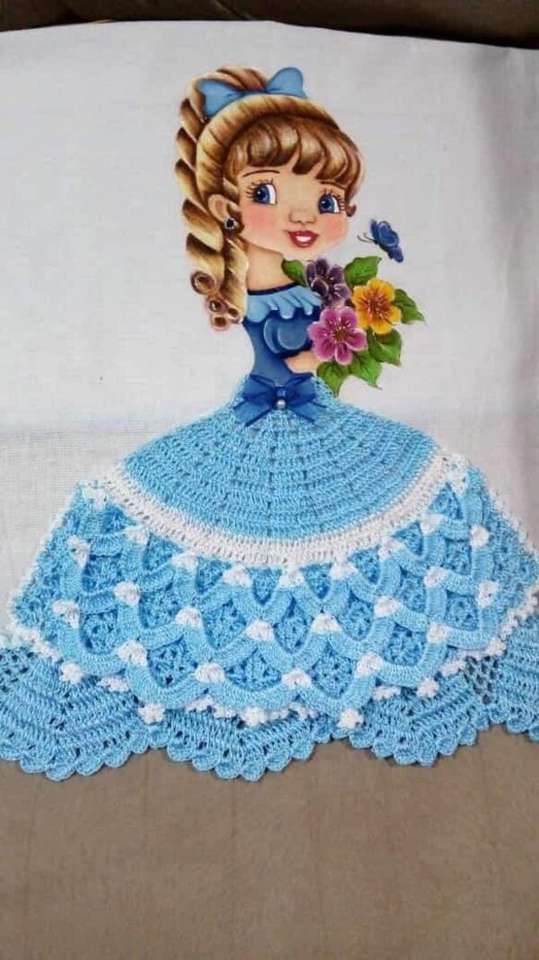 Light blue knitted skirt doll jigsaw puzzle online