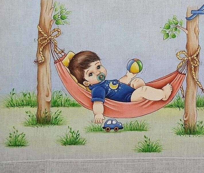 Lilla bebis vilar i hängmatta Pussel online