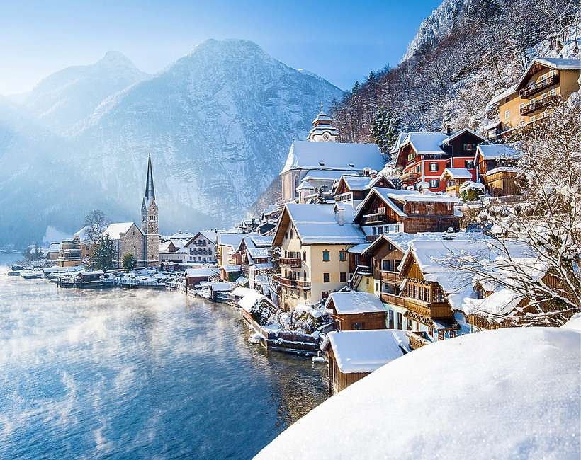 Coast with a town in winter jigsaw puzzle online