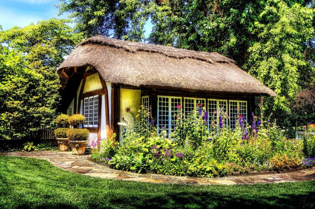 Een huisje met een rieten dak legpuzzel online