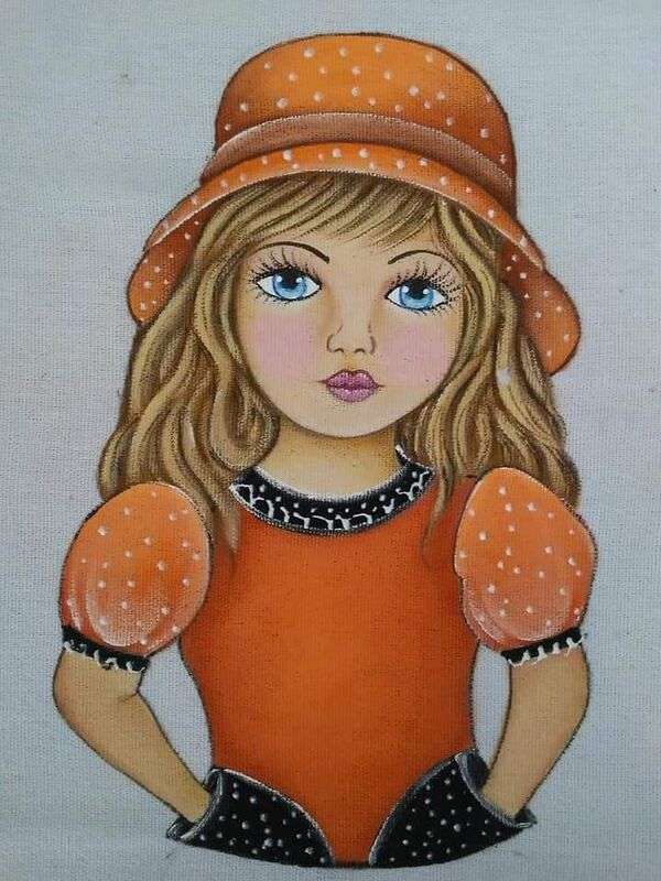 Bluză și pălărie portocalie de fată Diva puzzle online