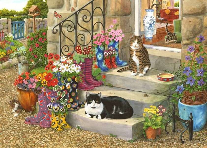 Gattini che riposano sulle gradinate puzzle online