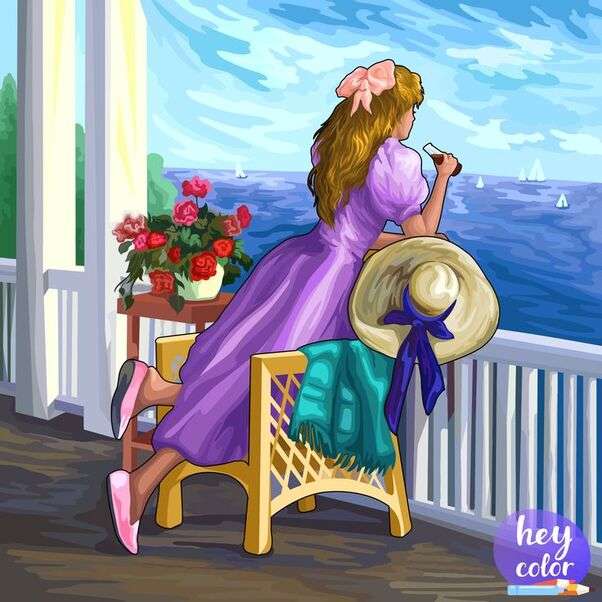 Dívka při pohledu na moře ze svého balkónu online puzzle