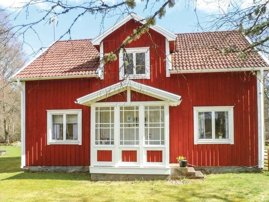 Скандинавський червоний будинок онлайн пазл