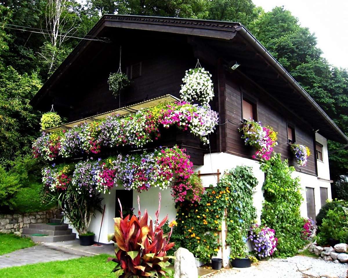 Huis in bloemen legpuzzel online