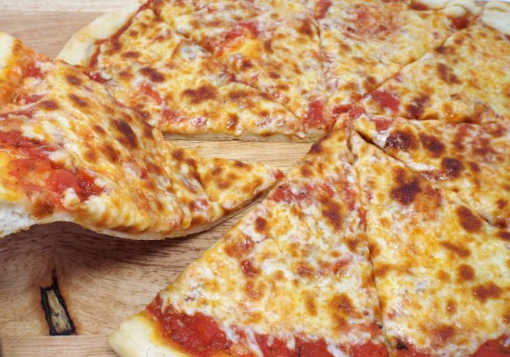 Pizza de queso al estilo de Nueva York rompecabezas en línea