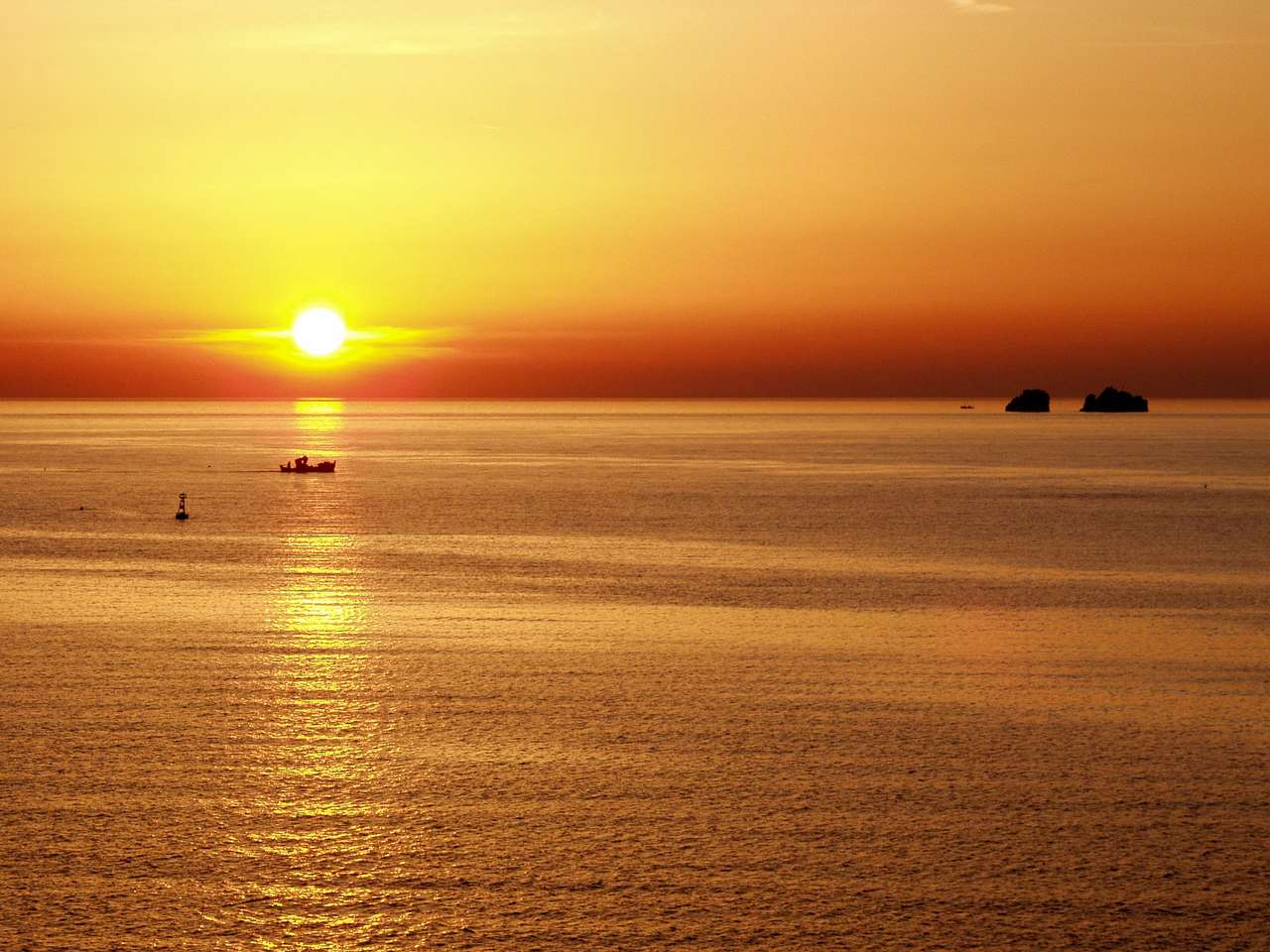 Den grekiska ön Paros Solnedgång pussel på nätet
