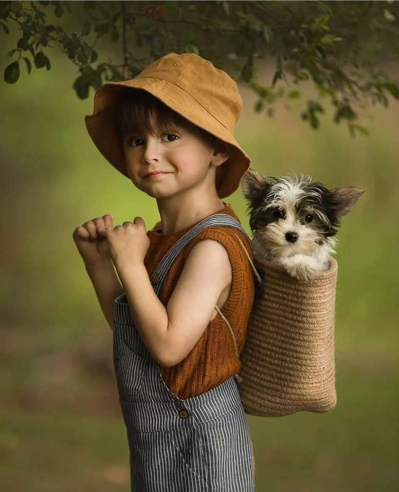 Uma criança com um cachorro em uma mochila puzzle online
