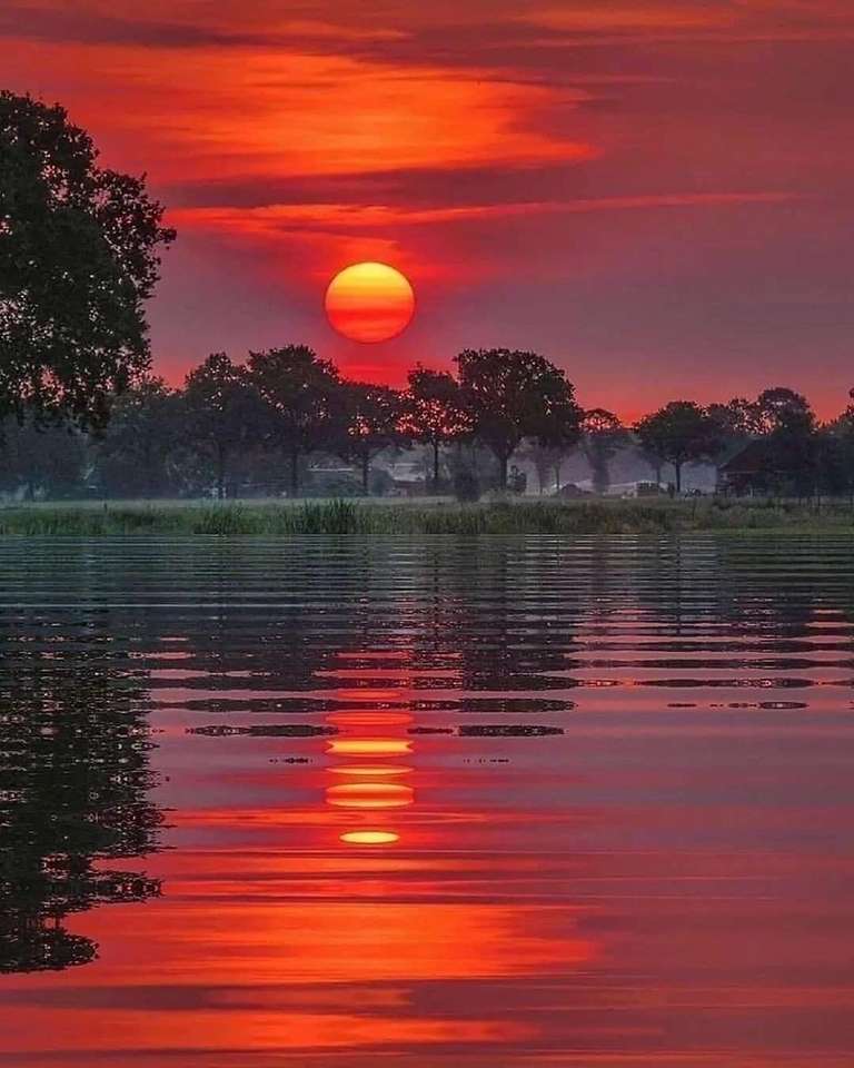 puesta de sol junto al lago rompecabezas en línea