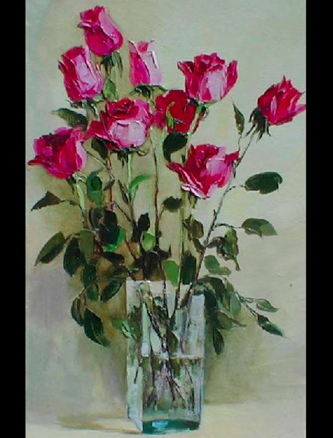 Fire roses in a glass vase jigsaw puzzle online