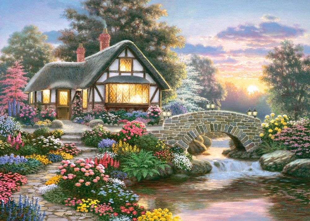 O casă sub un acoperiș de paie lângă râu puzzle online