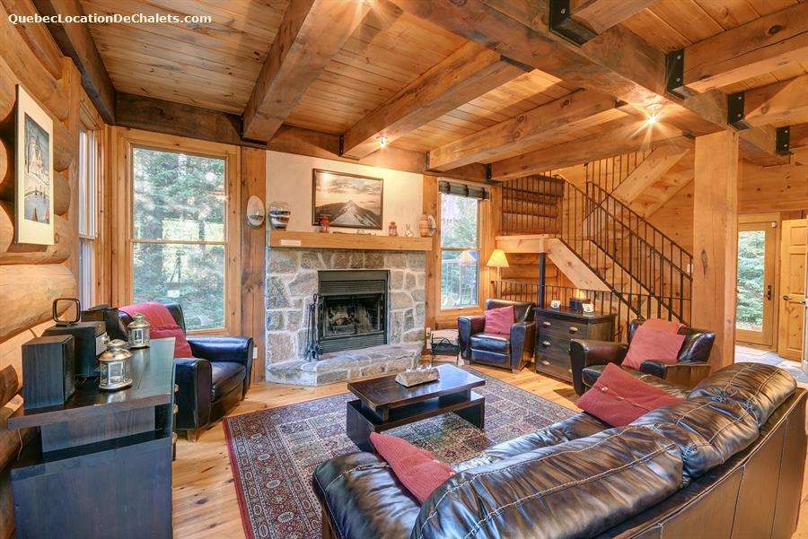 Living room with fireplace in a wooden house jigsaw puzzle online