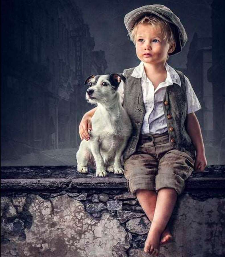 Un garçon et un chien - une belle parka puzzle en ligne