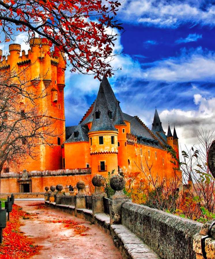 Um castelo na cor dourada do outono quebra-cabeças online
