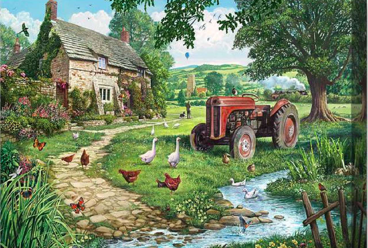 A lovely old manor house and an ancient tractor jigsaw puzzle online