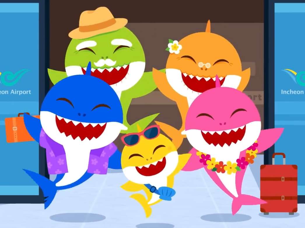 Rodina žraloků na dovolené online puzzle