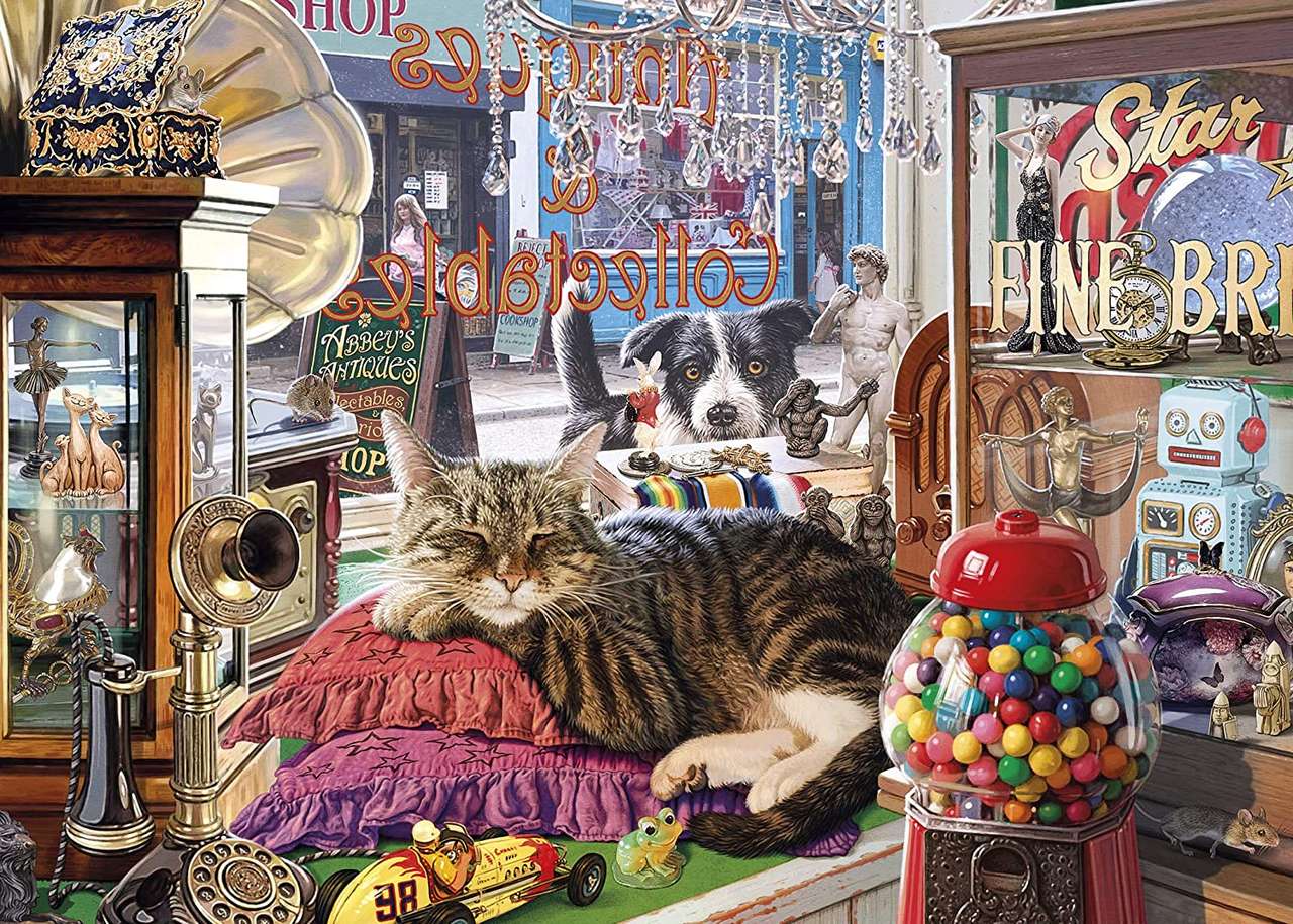 katt i fönstret i en antikaffär Pussel online