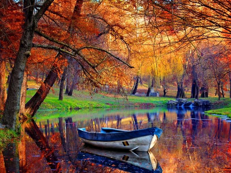 Heerlijk herfst in het park bij de vijver online puzzel