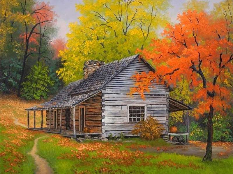 Une cabane rustique dans les bois aux couleurs d'automne puzzle en ligne