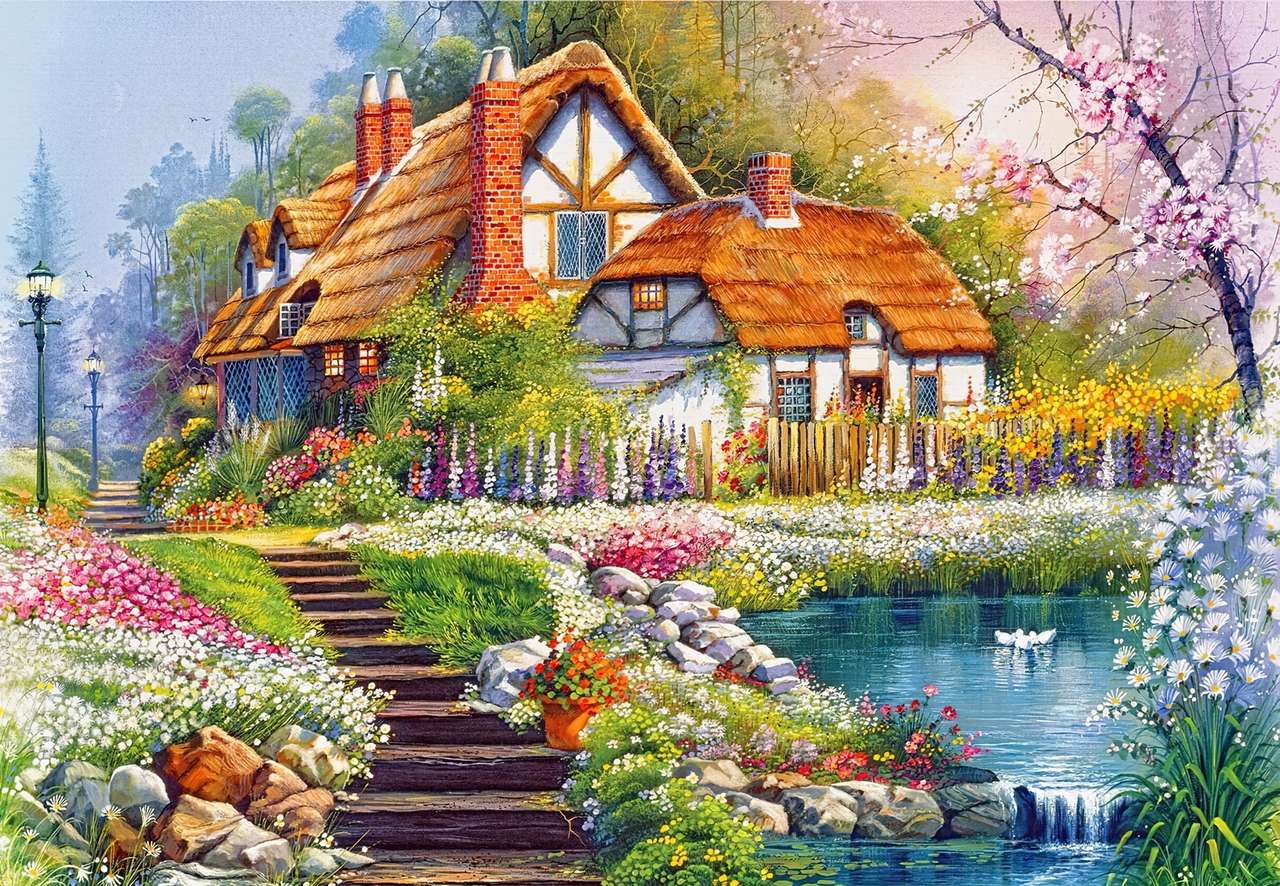 Krásný dům s kamennými schody a rybníkem skládačky online