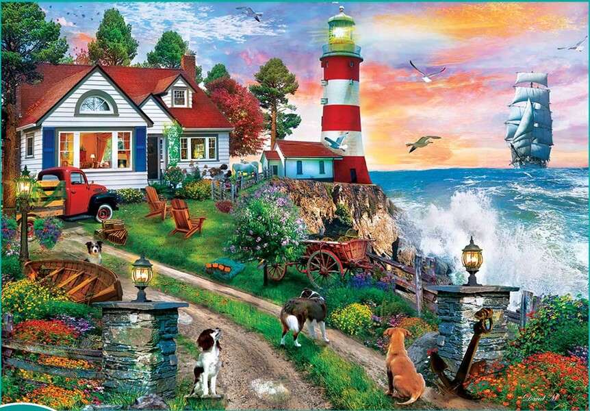 House with lighthouse on the shores of the beach jigsaw puzzle online