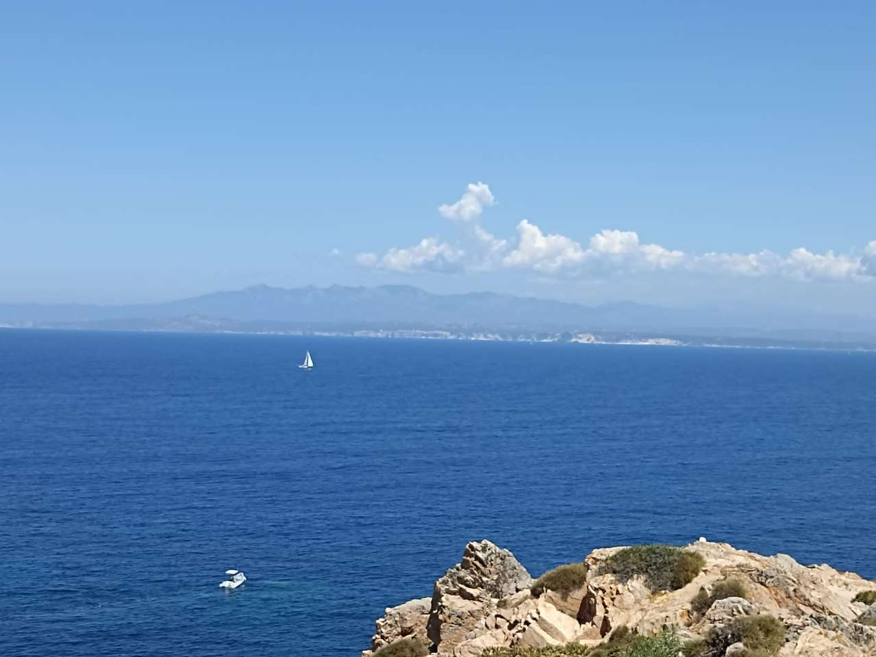 Corsica gezien vanaf Santa Teresa di Gallura legpuzzel online