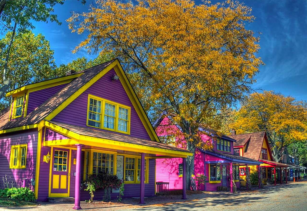 Una calle con casas de colores, una hermosa vista rompecabezas en línea
