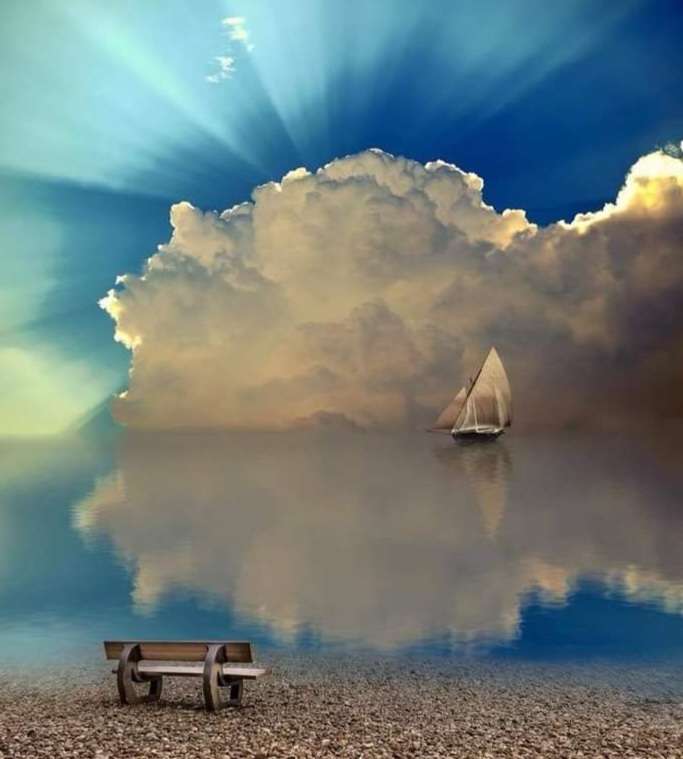 Um veleiro protegido por um bloco de nuvens. puzzle online