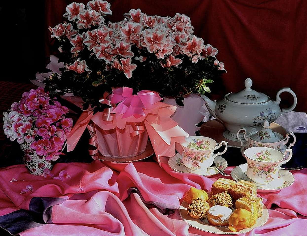 Skönheten med ett afternoon tea som serveras Pussel online