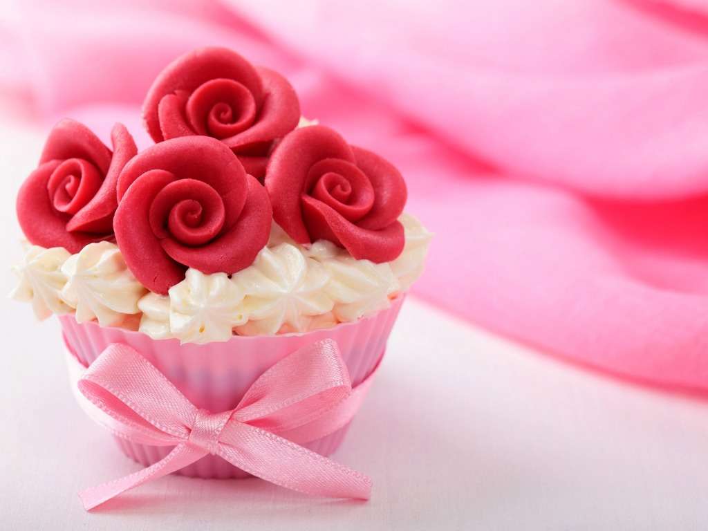 En underbar, god cupcake gjord med hjärta pussel på nätet