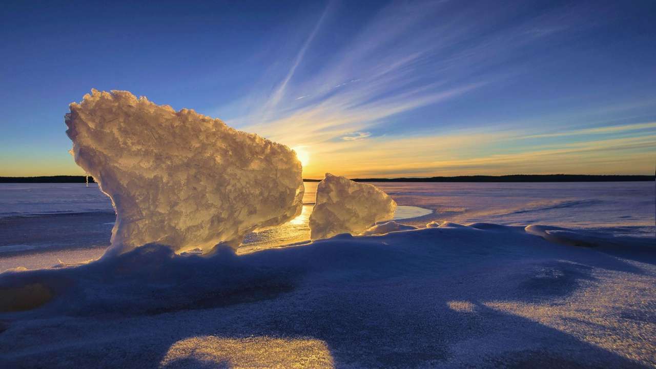 Finlanda-Lacul Karijaerv la răsăritul soarelui puzzle online