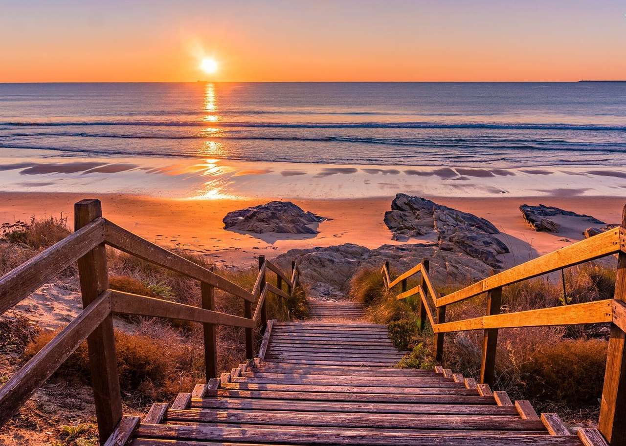 Descente vers les plages du Portugal au coucher du soleil puzzle en ligne