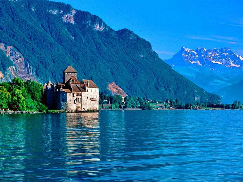 Uma velha casa como um palácio no Lago de Genebra puzzle online