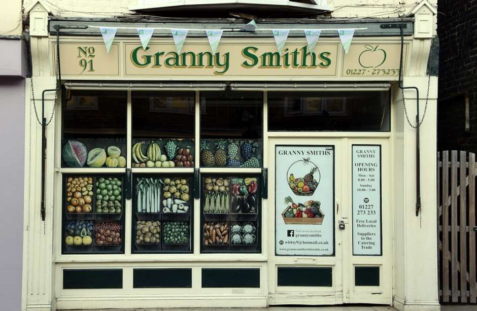 Un marchand de légumes à l'ancienne quelque part en Angleterre puzzle en ligne