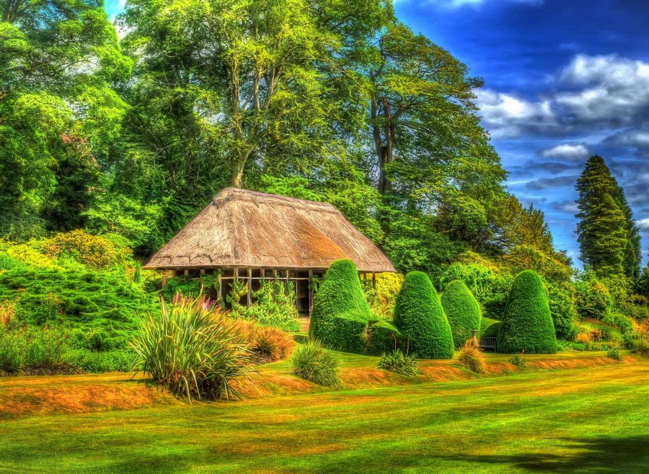 A charming cottage in a "sea" of greenery, a beautiful view jigsaw puzzle online