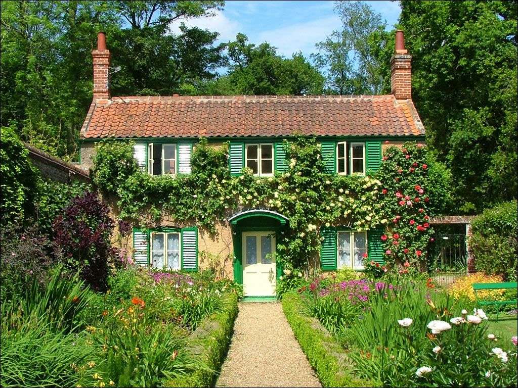 Lidový dům ve venkovském stylu plný květin online puzzle