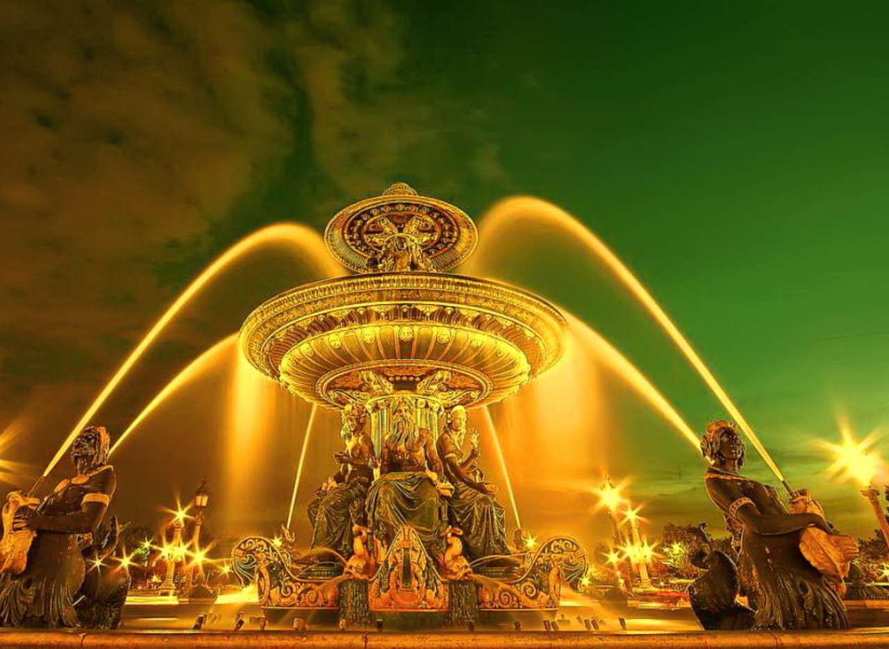 Париж-Красотата на фонтана през нощта на Place de la Concorde онлайн пъзел