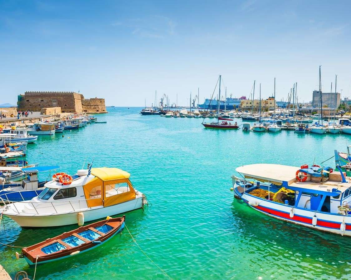 Boats in a bay in Crete jigsaw puzzle online