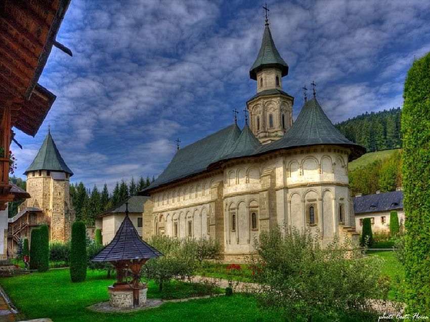 Romania - fortified monastery monastery with a wishing well jigsaw puzzle online
