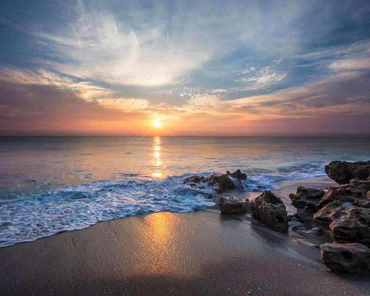 puesta de sol junto al mar rompecabezas en línea