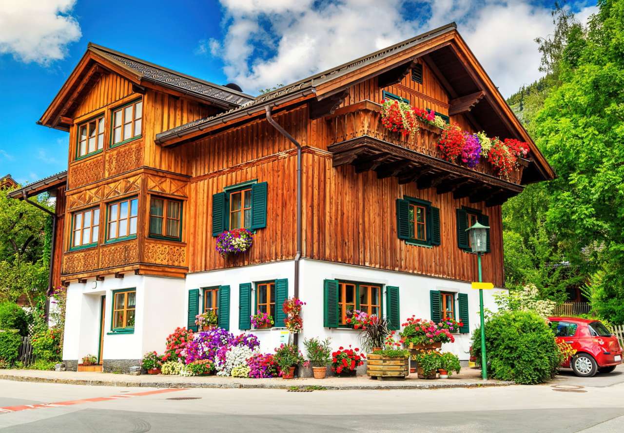 Prachtig houten alpenhuis legpuzzel online