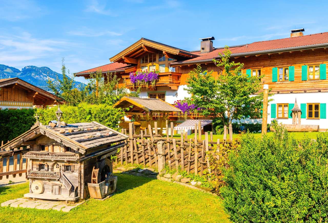 Австрія-Тіроль-Типовий альпійський дерев'яний будинок онлайн пазл