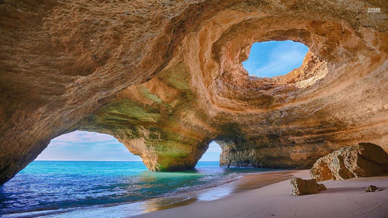 Beautiful cave on the beach jigsaw puzzle online
