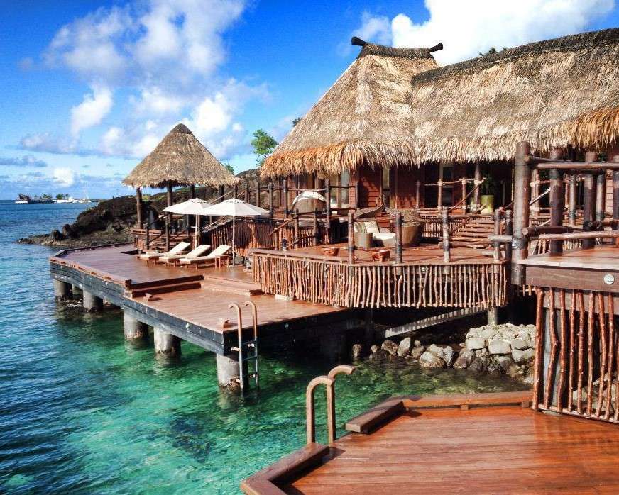 Casa de vacaciones en el mar en los trópicos rompecabezas en línea